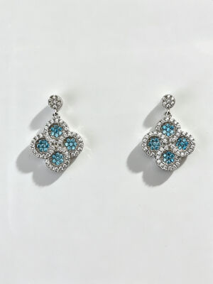 2026 Nuevo verano caliente 925 Cerritos de plata CZ Revestidos de rodio Hipoalergénico Diseño de círculo de flores de suerte con aguamarina y piedras blancas AAA CZ