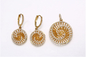 El oro espiral de AAA+ CZ 925 Sterling Silver Bridal Sets Circular plateó los pendientes de plata