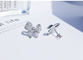 El platino Diamond Bow Stud Earrings 0.10ct CONTRA la claridad 4.5gram modificó para requisitos particulares